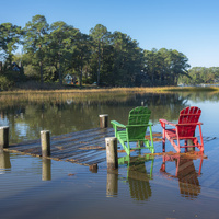 Chairs on Dock, from the series Tidewater, 2020.  Greta Pratt